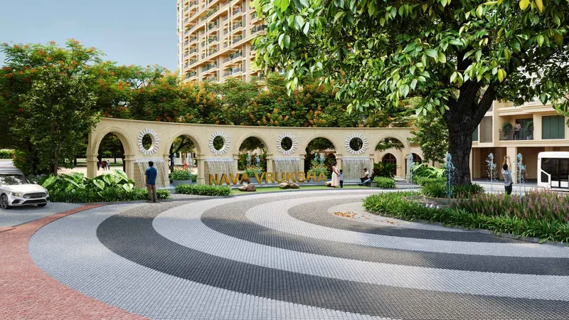 Arrival plaza with arched feature wall and towers behind