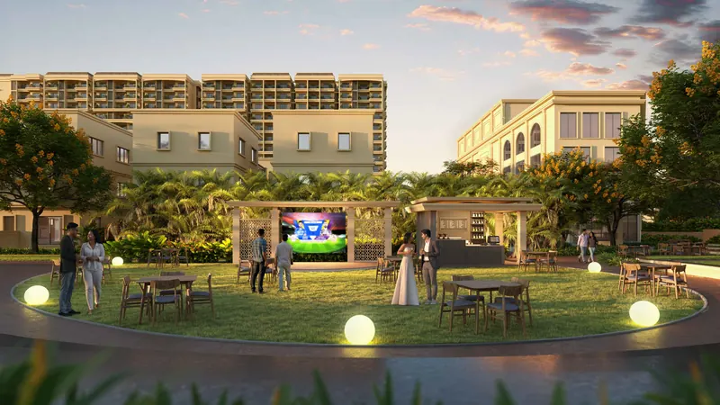 Open-air party lawn with projection wall at Nava Vruksha